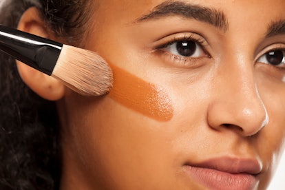 Foundation brush vs sponge: Makeup artists break down how to apply foundation with a brush.