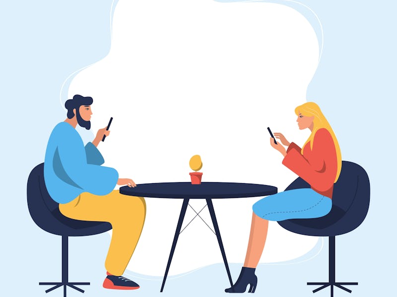 Gadget addiction, friends at dinner dependent on smartphones. young people having lunch together but...