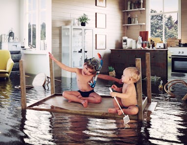 kids pday on the table while flooding in the kitchen. Photo and media photocombination