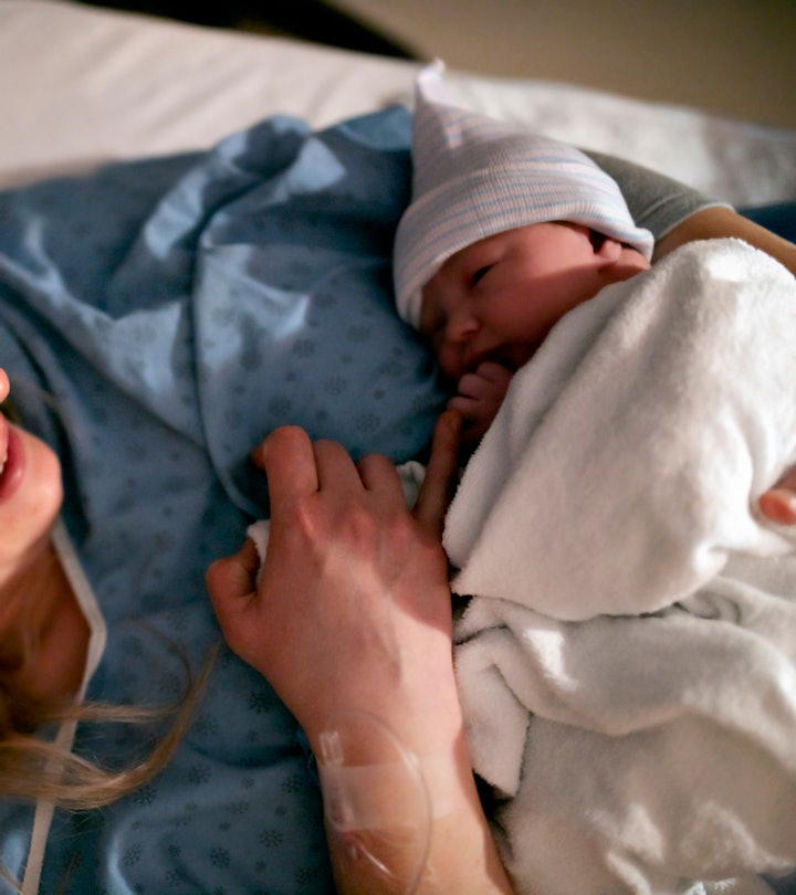 Woman holding baby post c-section, Doctors explain how to get out of bed after a c section. 