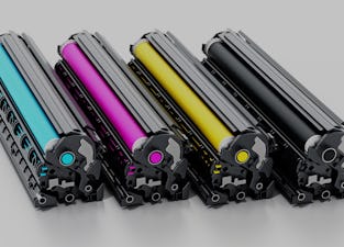 Stack of laser printer CMYK toners. 3D illustration.