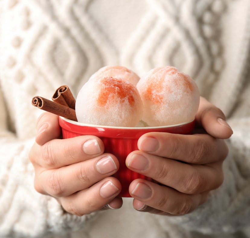 A woman makes a snow cream recipe from TikTok.