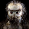 homo sapiens man face isolated on black