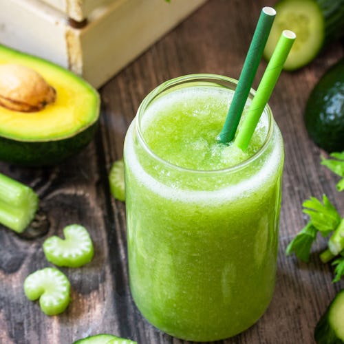 Vegan diet and nutrition, healthy detox, vegetarian concepts drinks. Green smoothie celery, avocado,...
