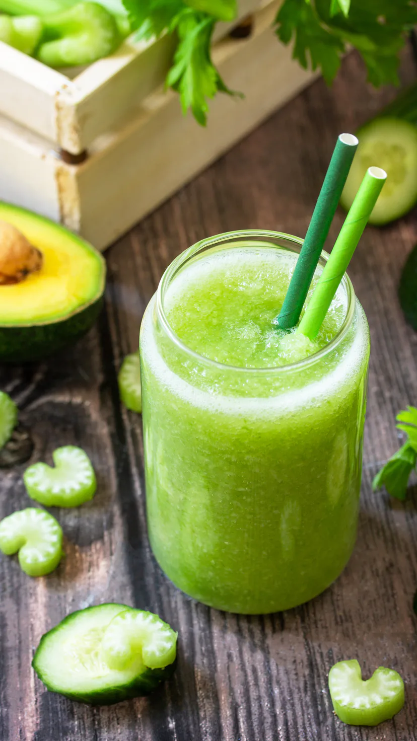 Vegan diet and nutrition, healthy detox, vegetarian concepts drinks. Green smoothie celery, avocado,...