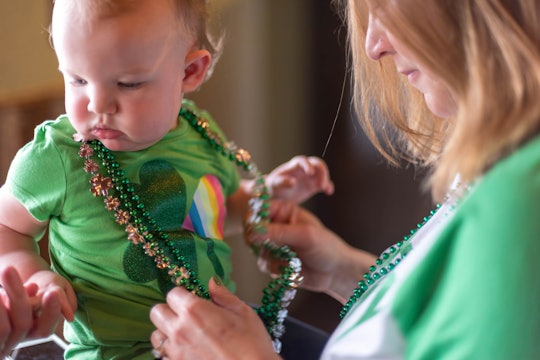 Woman and baby celebrating St. Patrick's Day