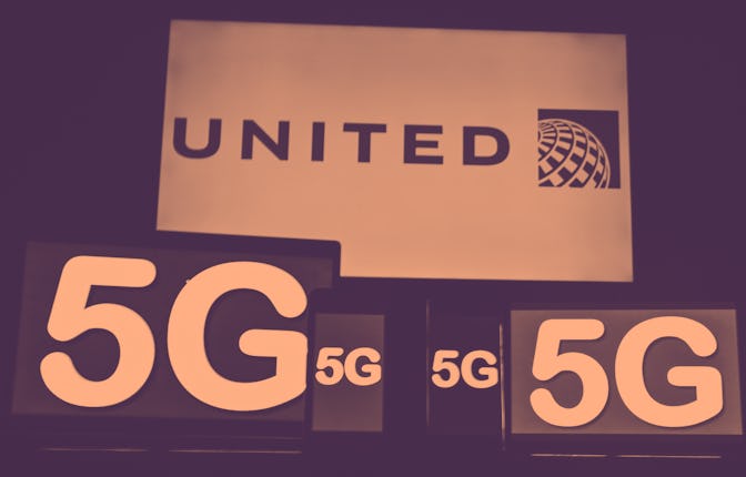 Images of the 5G sign displayed on the screens of mobile phones and computers in front of the United...