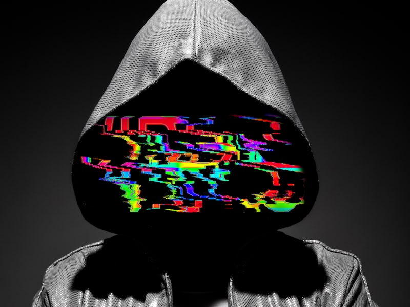 Man in the hood with shaded face. Hacker.