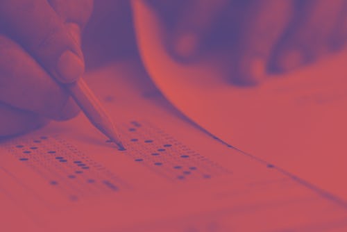 Education school test concept : Hands student holding pencil for testing exams writing answer sheet ...