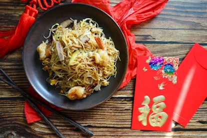 Chinese Lunar New Year lucky food include longevity noodles.