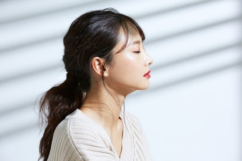 Beauty portrait of young Asian women on light and shadow background