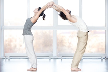 Yoga poses for 2 include practicing your backbend together.
