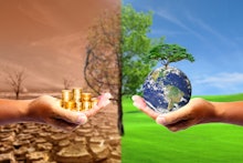 The left hand holds money. Right hand holding a earth There is a bokeh background. Design concept Na...