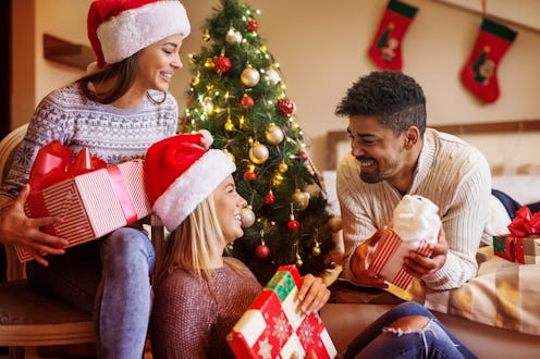 Friends spending time together and having chit-chat conversation on Christmas.