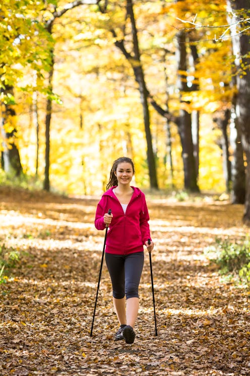 Nordic walking benefits, explained by fitness pros.
