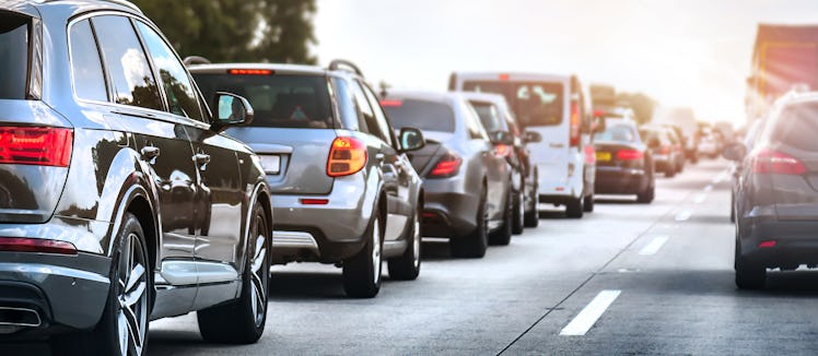 Car rush hours city street. Cars on highway in traffic jam