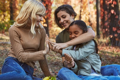 two moms with a daughter in a list of quotes about blended families