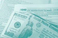 Stimulus economic tax return check and and 1040 Form.