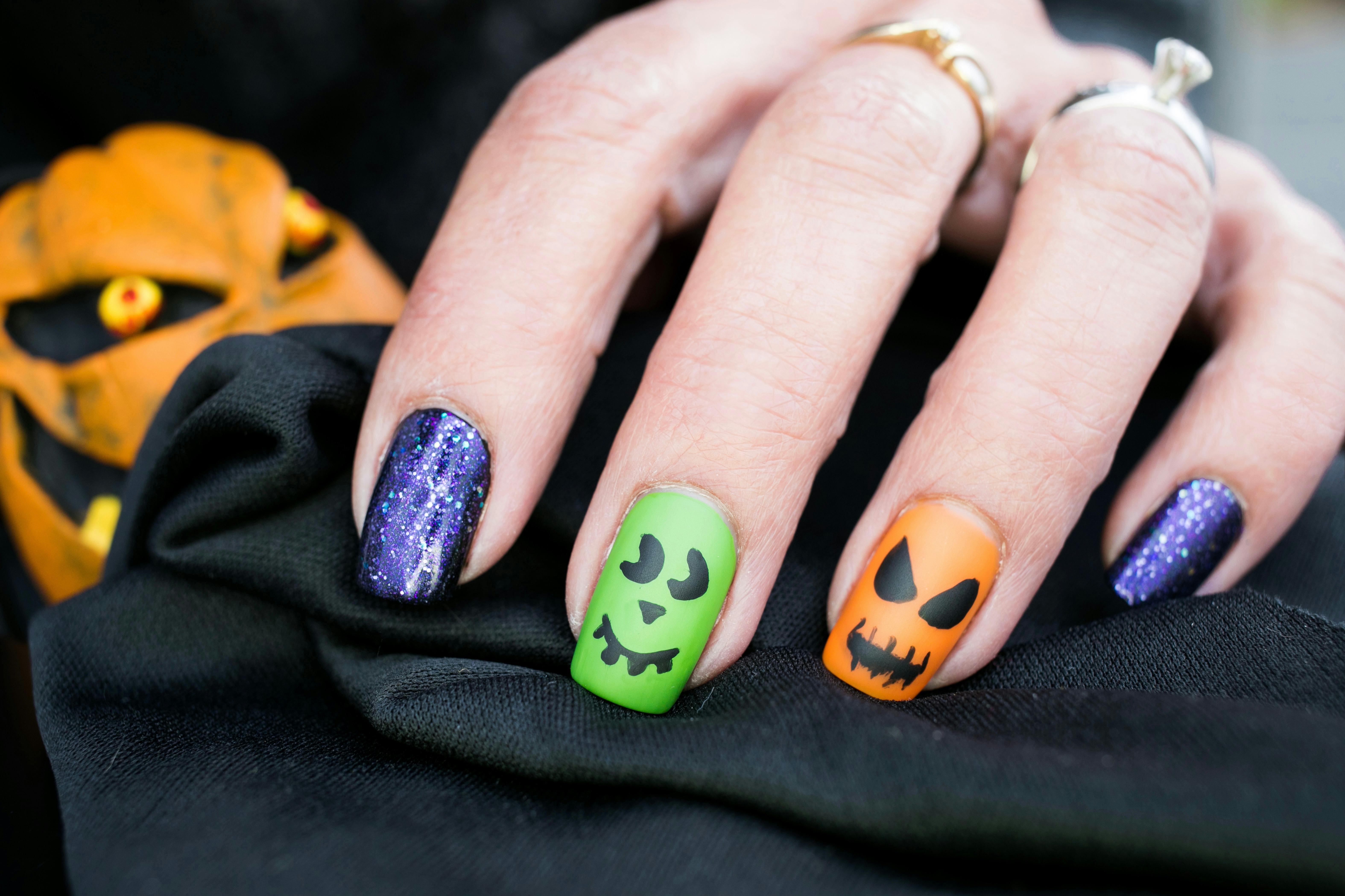 13 Halloween Nail Designs That Are Spooky & Glam