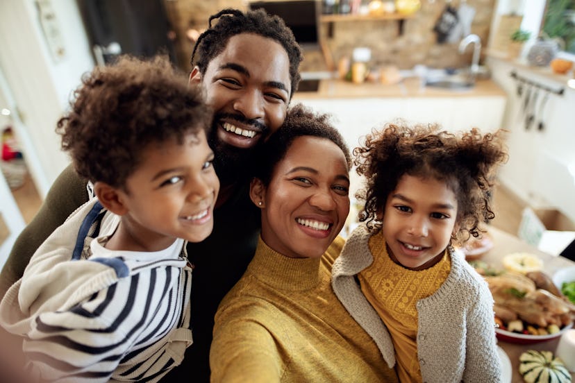 Family having fun on Thanksgiving in an article about thanksgiving dinner instagram captions