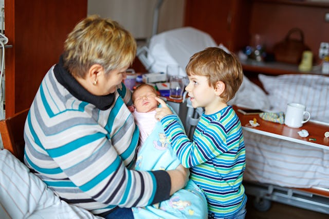 Reddit popped off on a grandmother who wanted to hold her son's new baby — before anyone else in the...