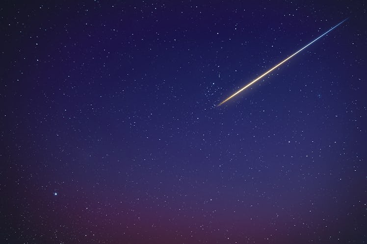 Stars, meteor trail on evening sky.