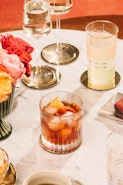 Negroni, an italian IBA cocktail with gin, bitter and vermouth; in luxury elegant home, homemade dri...