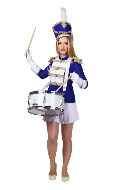 beautiful blond woman  cheerleade drummer isolated on white background