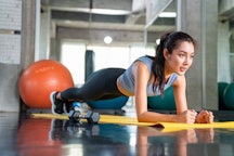 Here's how long to hold a plank, according to trainers.