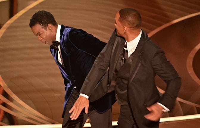 Will Smith appears to strike Chris Rock