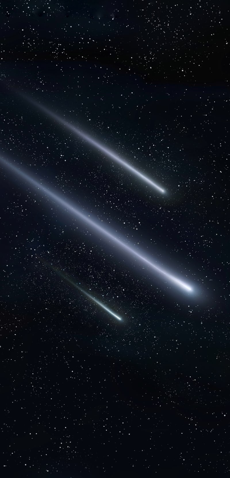 Meteor trails in the night sky, beautiful meteor shower. falling stars. Three meteorites burn up in ...