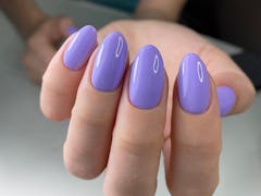 A Digital Lavender manicure trend as seen on medium-length, almond-shaped lavender nails.