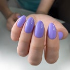 A Digital Lavender manicure trend as seen on medium-length, almond-shaped lavender nails.