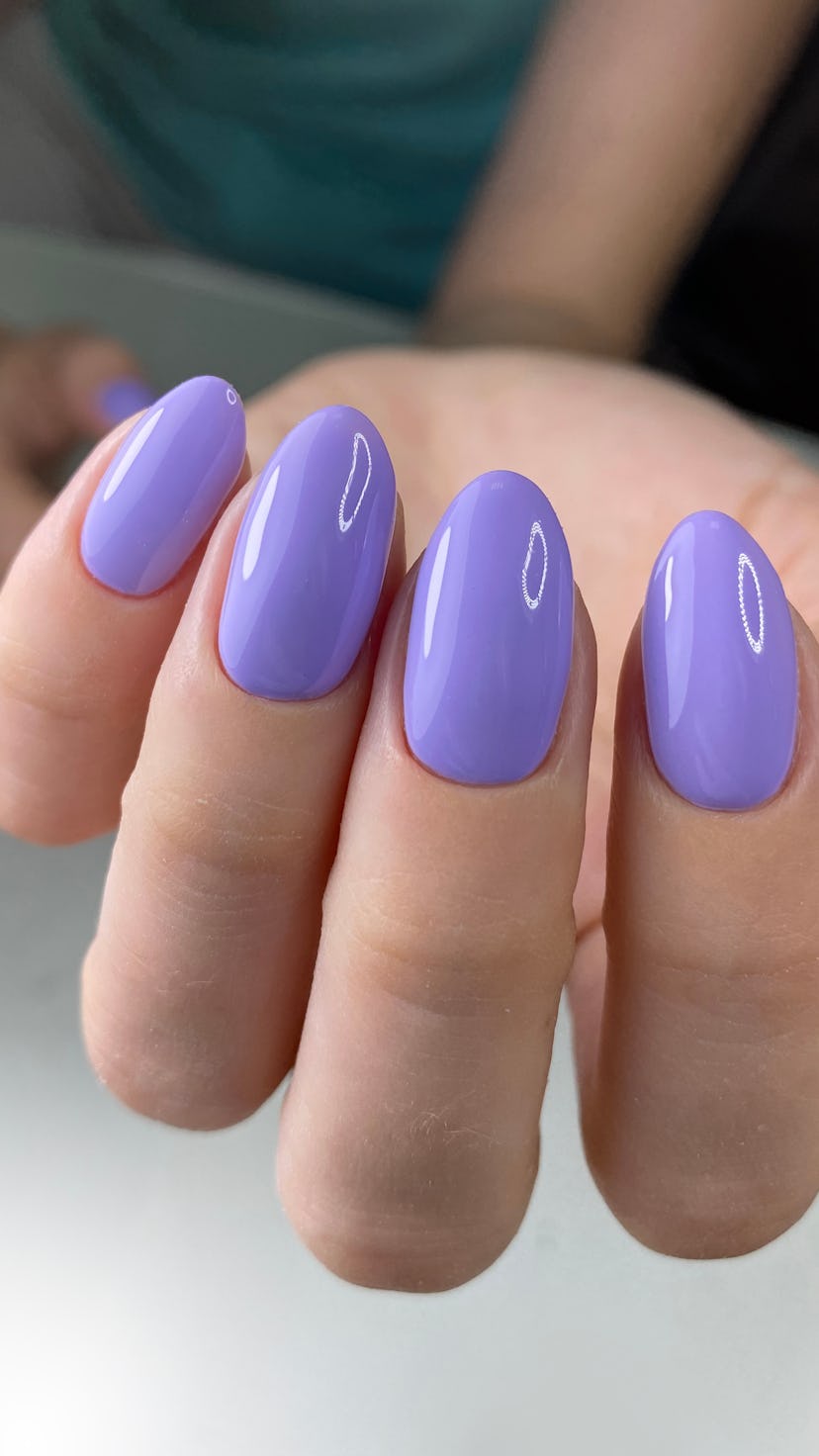 A Digital Lavender manicure trend as seen on medium-length, almond-shaped lavender nails.