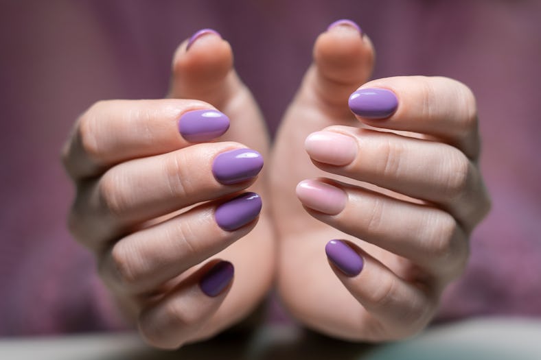 A Digital Lavender manicure trend as seen on short-length, almond-shaped nails.