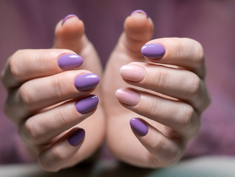 A Digital Lavender manicure trend as seen on short-length, almond-shaped nails.