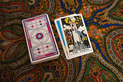 The meaning of the tower tarot card, explained.