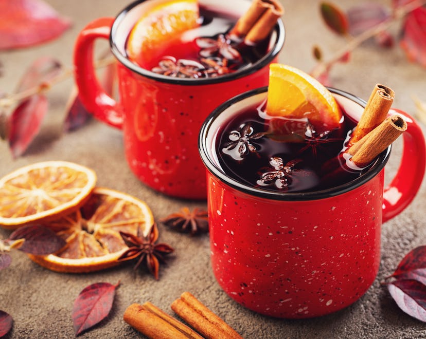 Two cups of autumn mulled wine for mulled wine instagram captions.
