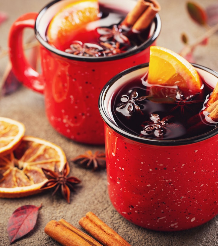 Two cups of autumn mulled wine for mulled wine instagram captions.