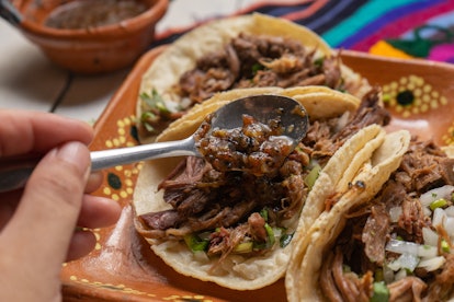 Traditional mexican slow cooked lamb tacos might not be traditional winter solstice food, but they'r...