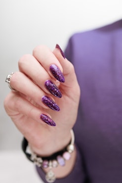 Purple is Capricorn's lucky color, so these purple nails are a great choice.