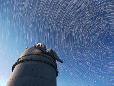 Astronomical observatory under the night sky stars. Blue sky with hundreds of stars of the Milky way...