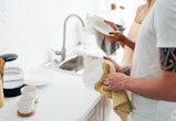 couple washing dishes, how to ask your husband to help around the house