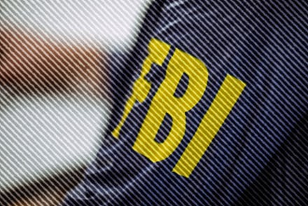 FBI agent wearing FBI uniform, part of