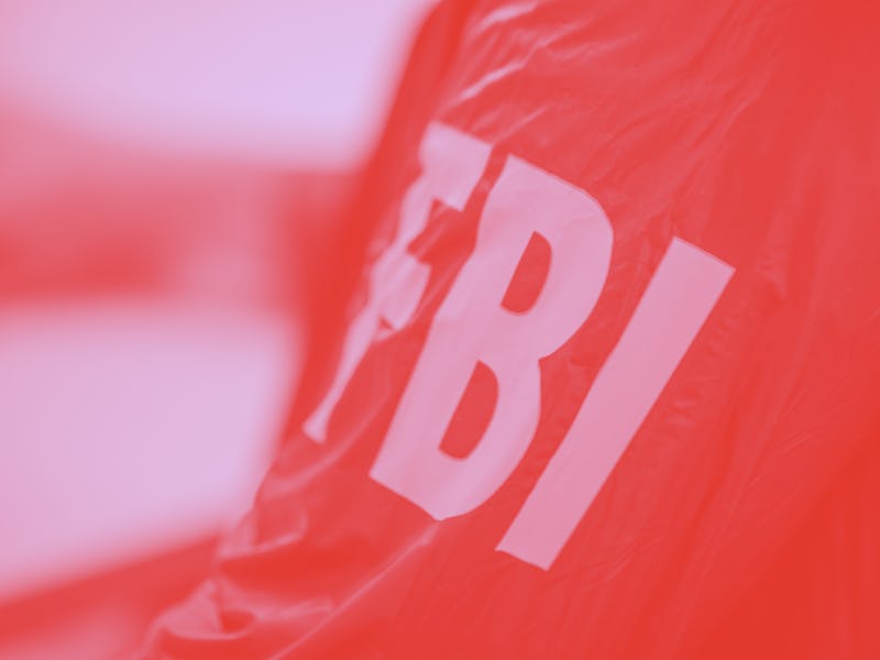 FBI agent wearing FBI uniform, part of