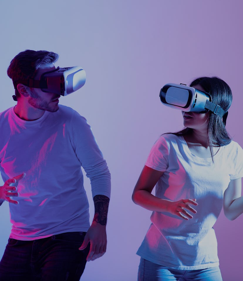 Online game, fun together, entertainment and modern active date. Cheerful young guy and asian lady i...