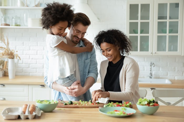 family preparing meal together