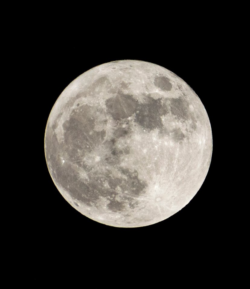 Super full moon with dark background. Madrid, Spain, Europe. Horizontal Photography.
