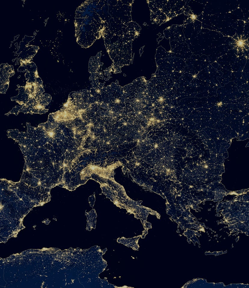 Europe map in global satellite photo, view of city lights on night Earth from space. EU and Mediterr...
