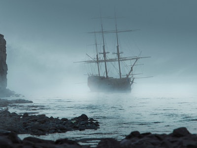 weird figure standing near the ocean on a sandstone beach looking at a ghost ship approaching the co...
